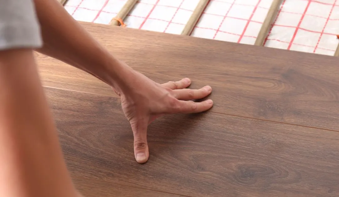 Laminate & Engineered Wood for Underfloor Heating: UK Guide 2026 - Comprehensive guide covering design & planning for underfloor heating systems