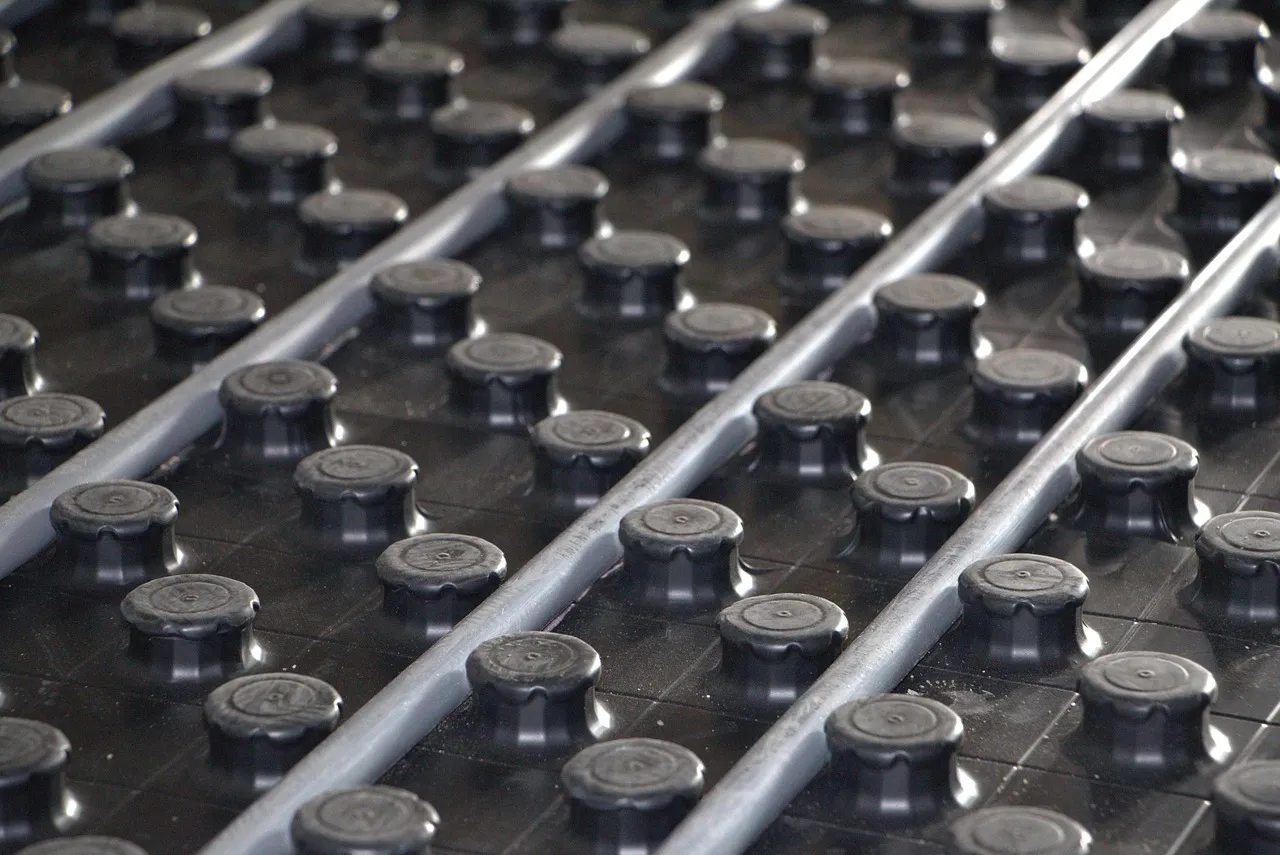 Low-profile wet underfloor heating boards for a UK retrofit